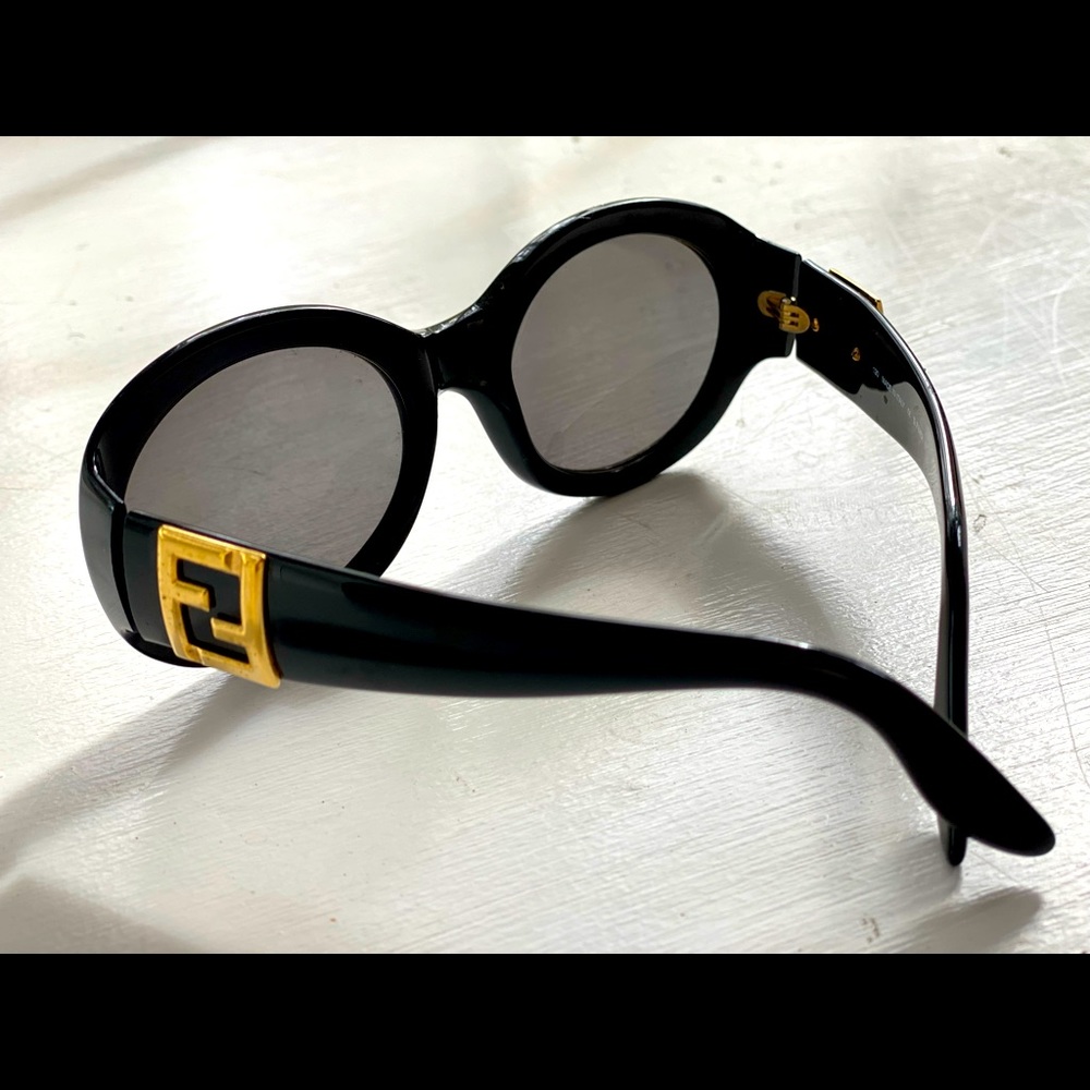 Vintage Fendi sunglasses; black w/ gold Fendi logo - excellent condition